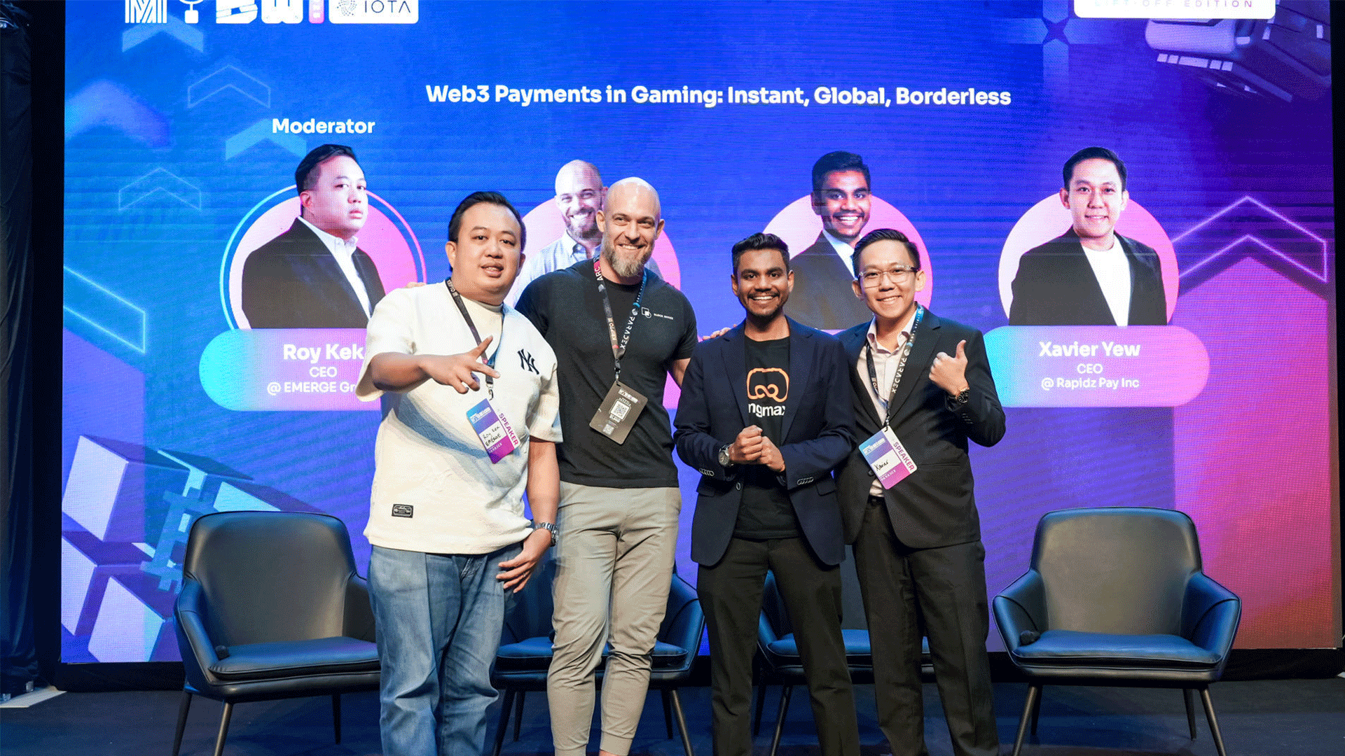 A group photo of the panel on gaming payments at Malaysia Blockchain Week 2025, with moderator and speakers on stage.
